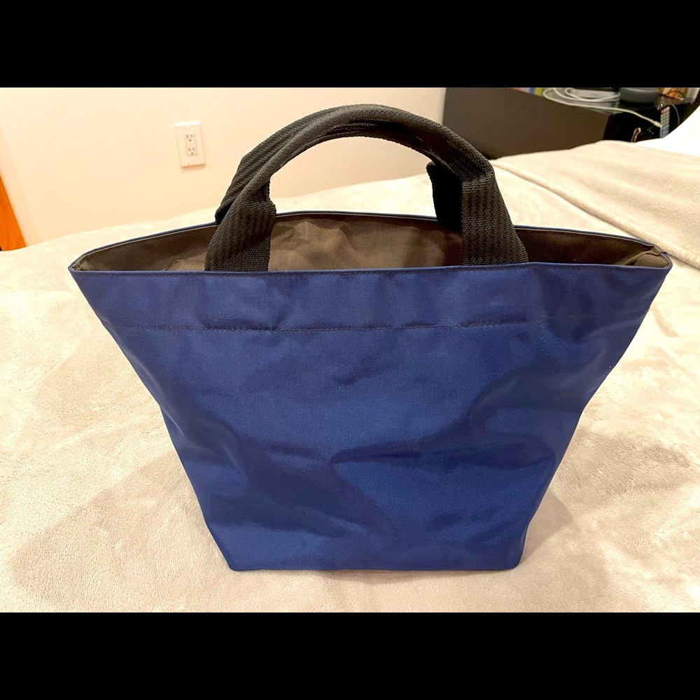 HERVE CHAPELIER nylon boat tote in navy with brown trim; never used